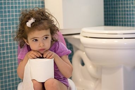 child on toilet